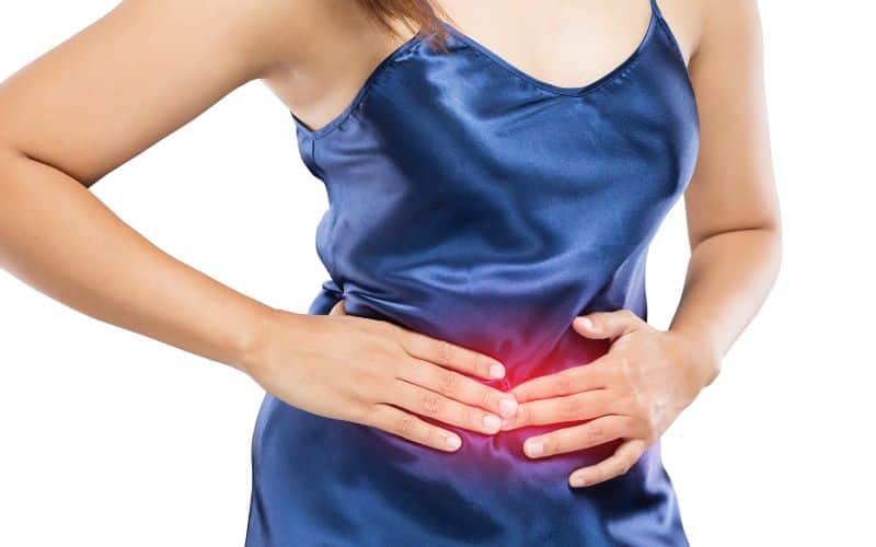 woman experiencing Gastrointestinal issues